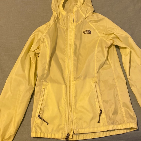 The North Face Jackets & Blazers - North Face lightweight hooded raincoat, size XS, yellow